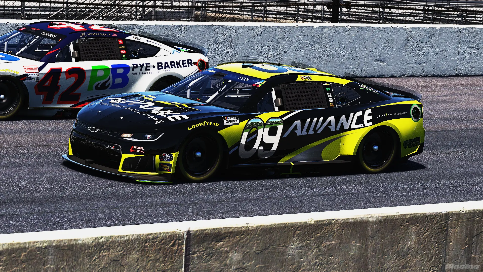 AARC Cup Series stock cars battling side by side along the wall
